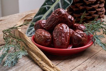 Red jujube on wood table