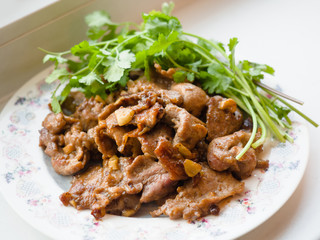 Pork stir fried garlic and soy source serve with fresh coriander. Thai food., Thai food, delicious Thai-cuisine.