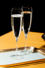 Flutes filled with sparkling Prosecco, in pop contemporary style. Prosecco is a white sparkling wine cultivated and produced in Valdobbiadene-Conegliano area.