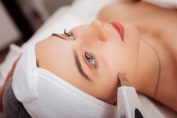 Nice good looking woman enjoying her procedure