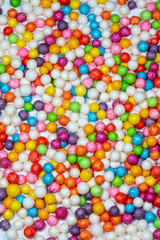 Fototapeta na wymiar Colorful bright background, multi-colored balls. Sweet nice background candy. 