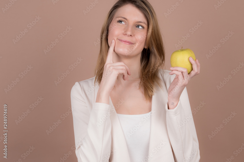 Wall mural girl with an apple