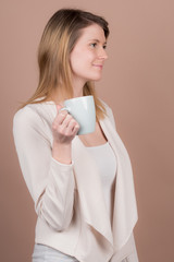 girl with a cup of tea and coffee