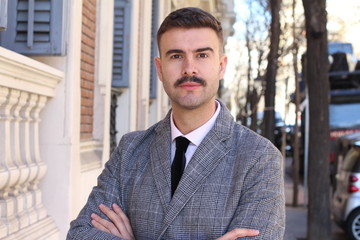 Classic looking businessman with a moustache