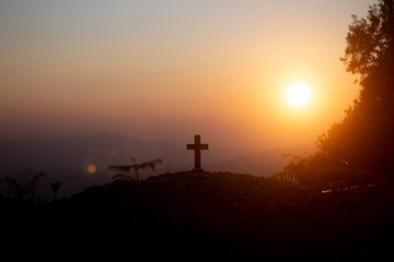 Fototapeta na wymiar Resurrection concept:Crucifixion Of Jesus Christ Cross At Sunset