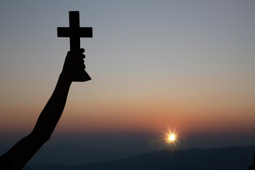 Resurrection concept:Crucifixion Of Jesus Christ Cross At Sunset