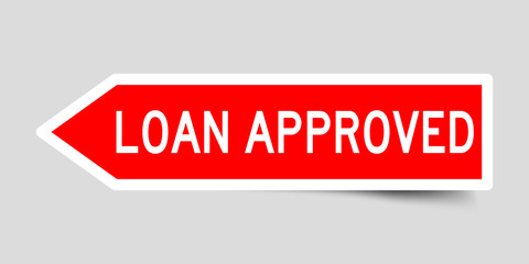 Arrow shape red color sticker in word loan approved on gray background