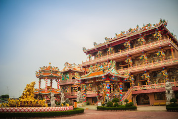 Beautiful architectural buildings at Wihan Thep Sathit Phra Kitti Chaloem, the famous Nezha Chinese public temple in Chonburi province, Thailand.