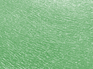 beautiful texture emboss blurred background of close up foam sheet in light green color, plastic foam sheet background light green color, focus and blurred texture background light green color