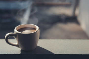 Coffee cup on blur background with copy space
