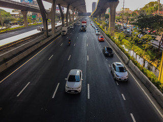 Bangkok, Thailand - March 14, 2017: Traffic flow at the street in front of Central Bangna department store, Bangna-Trad expressway from Bangkokk to Trad province, the far eastern part of Thailand.