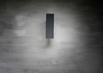 Concrete wall with lamp hang