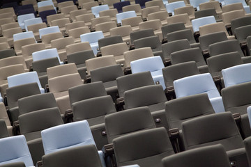 rows of empty seats in a stadium