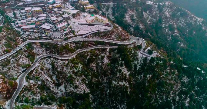 The picturesque town of Mussoorie and its neighbouring areas covered with thick sheets of snow.Mussoorie is a popular hill station in Uttarakhand, India.Famous for hills,mountains,snowfall,winterline.