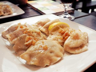 Tasty Polish, Ukrainian, Russian traditional dumplings with greaves