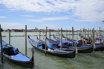 Obraz na płótnie Canvas Empty gondola waiting for the passengers in Venice, Italy