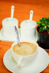 cup of coffee on the wooden