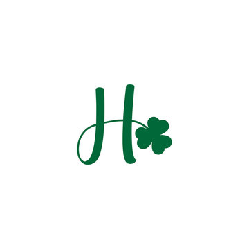 initial letter Shamrock leaf