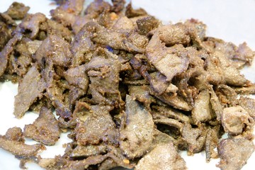 Close up Fried pork liver isolated on white background