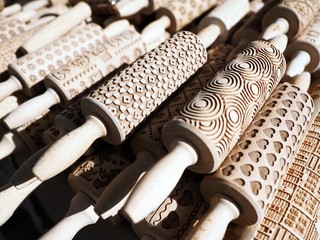 Traditional wooden rolling pins with texture of beautiful traditional pattern 