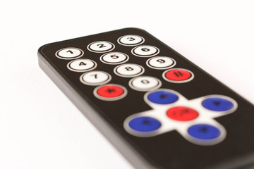 Small remote control. Isolated on white background.