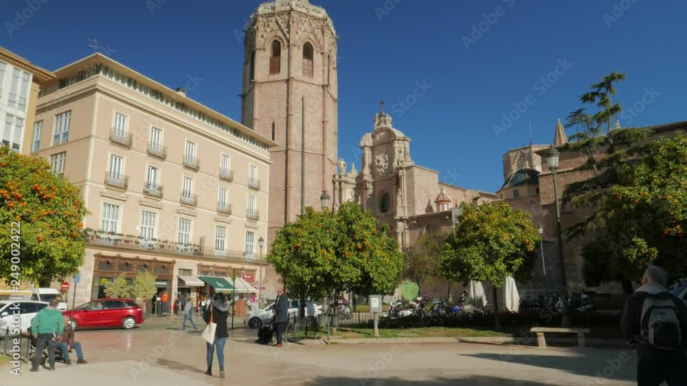 Wall mural Miguelete, the belfry tower of the cathedral and the Basilica of the Assumption of Our Lady of Valencia, Spain