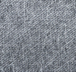  The textured gray natural fabric . 