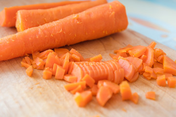 Sliced carrots into pieces. Sliced carrots on the table. Boiled carrots.