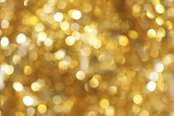 abstract blurred glowing lights of light gold shades