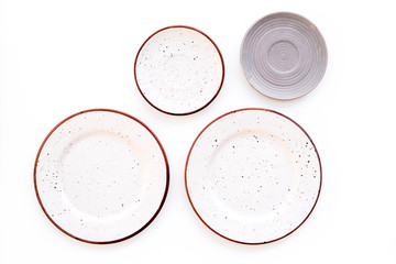 Mockup with plates. Empty ceramic plates on white background top view copy space