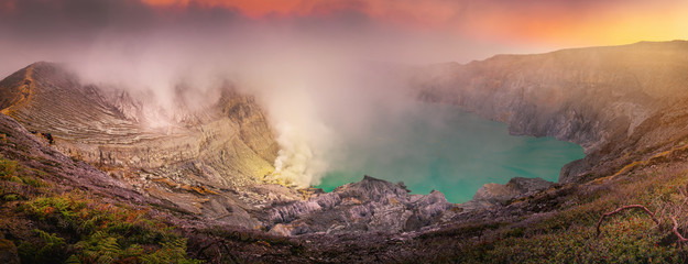 Panorama natural landscape of Kawah Ijen crater at sunrise scene., Panoramic scenery of volcano mount at Java, Indonesia., Travel destination and adventure trekking activity. Nature background