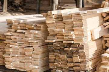 Logs sawn on the boards. Sawing boards. A lot of lumber.