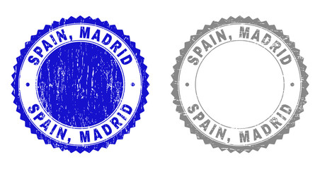 Grunge SPAIN, MADRID stamp seals isolated on a white background. Rosette seals with grunge texture in blue and grey colors. Vector rubber stamp imprint of SPAIN, MADRID title inside round rosette.