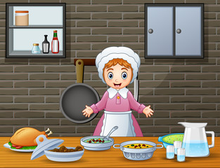 Cute cheerful woman cooking and preparing food in the kitchen