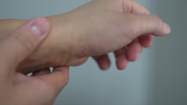 close up of experiencing wrist pain