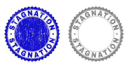 Grunge STAGNATION stamp seals isolated on a white background. Rosette seals with distress texture in blue and grey colors. Vector rubber stamp imprint of STAGNATION label inside round rosette.