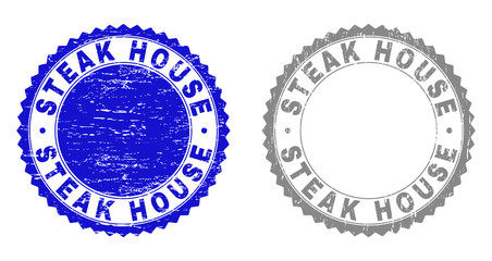 Obraz premium Grunge STEAK HOUSE stamp seals isolated on a white background. Rosette seals with grunge texture in blue and gray colors. Vector rubber watermark of STEAK HOUSE caption inside round rosette.