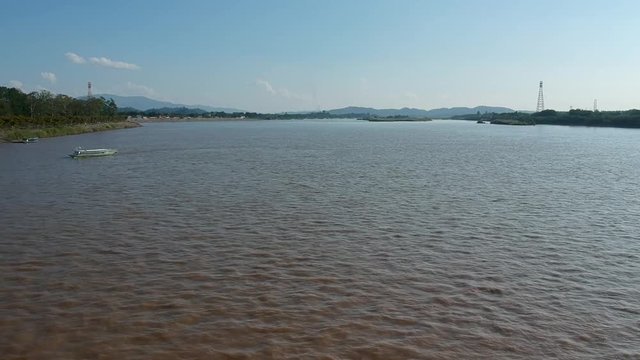 Flying over the Mekong river with Thailand in one side and Laos on the other