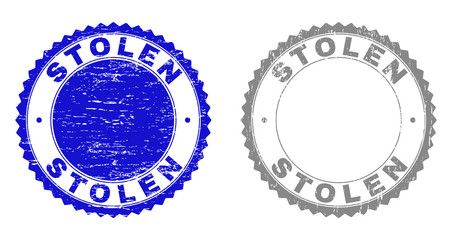 Grunge STOLEN stamp seals isolated on a white background. Rosette seals with grunge texture in blue and gray colors. Vector rubber stamp imprint of STOLEN label inside round rosette.