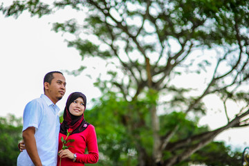 Young couple in love at the park enjoy the together. A happiness couple together. 