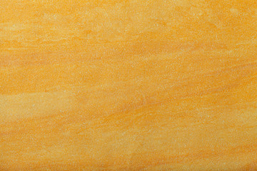 Abstract art background golden and yellow color. Multicolor painting on canvas.