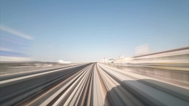 4K Timelapse - Modern driverless Dubai elevated Rail Metro System, running forward alongside the Sheikh Zayed Road