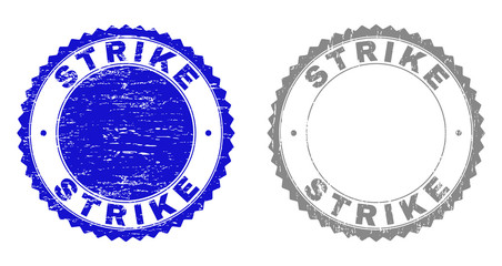 Grunge STRIKE stamp seals isolated on a white background. Rosette seals with grunge texture in blue and gray colors. Vector rubber stamp imprint of STRIKE caption inside round rosette.