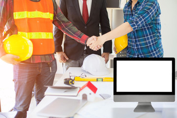 Agreement between the employer and architect Nick and desk of Architectural project in construction site or office