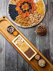 Healthy food. Selection of good carbohydrate sources, high fiber rich food. Low glycemic index diet. cereals, legumes, nuts, dried fruits. Wooden background copy space