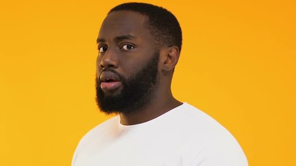 Afro-American man calling to visit shop with shocked discounts, huge sale - Powered by Adobe