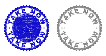 Grunge TAKE NOW stamp seals isolated on a white background. Rosette seals with grunge texture in blue and grey colors. Vector rubber stamp imprint of TAKE NOW label inside round rosette.