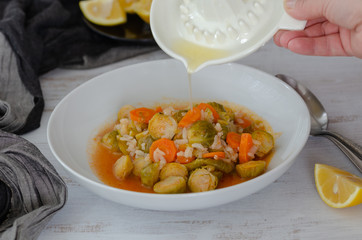 Brussels sprouts with olive oil, lemon ,carrots and rice