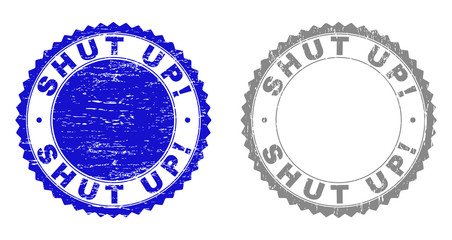 Grunge SHUT UP! stamp seals isolated on a white background. Rosette seals with grunge texture in blue and grey colors. Vector rubber stamp imprint of SHUT UP! title inside round rosette.