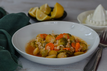 Brussels sprouts with olive oil, carrots and rice